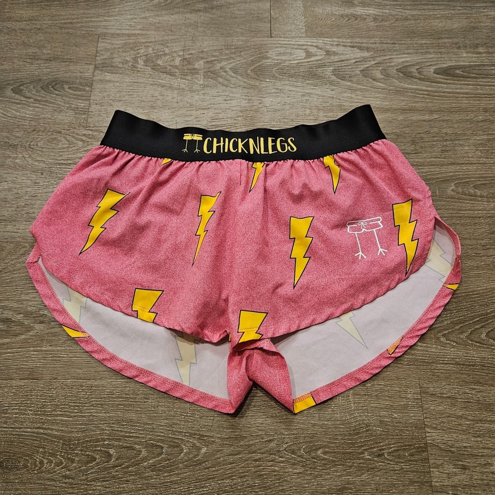 ChicknLegs Pink Bolts 1.5" Split Running Shorts Women's S Pink Yellow Lined